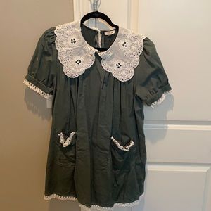 Green mini dress with lace collar